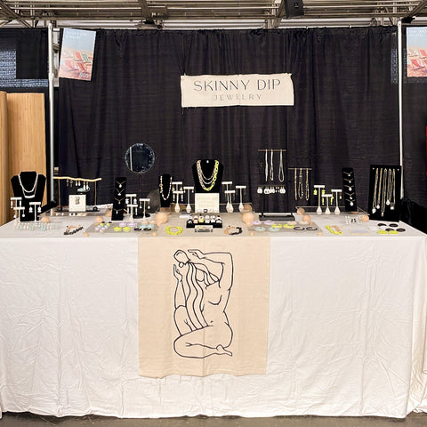 Skinny Dip Jewelry market setup booth